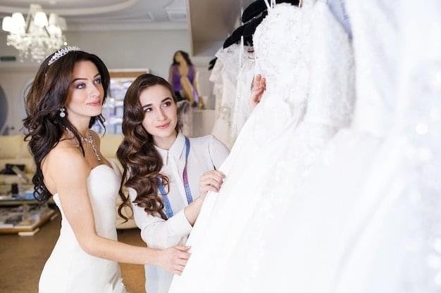 womens in elegant wedding dresses browse and discuss bridal gowns in a stylish bridal shop Rancho Cucamonga CA.